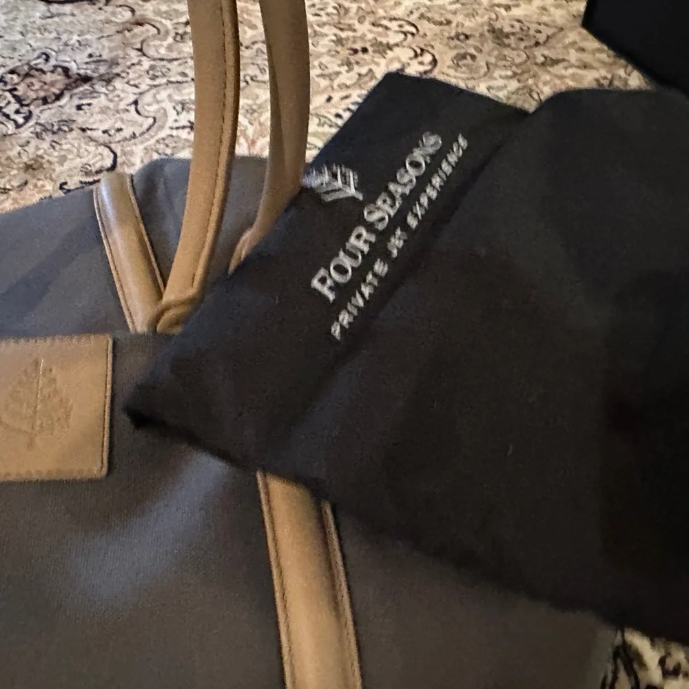 Exclusive Four seasons private jet experience duffel and toiletry kit.  BNWT